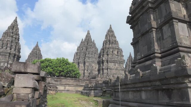 A 4K cinematic of Prambanan Temple during sunny weather, located in Yogyakarta. The largest Hindu temple complex in Indonesia, built in the 9th century AD by the Sanjaya Dynasty.