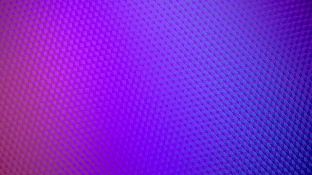 Halftone Gradient Texture Abstract. Seamless loop of dotted halftone pattern surface slowly rotating with smooth color transition from pink to blue creating vibrant dynamic gradient.