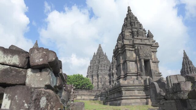 A 4K cinematic of Prambanan Temple during sunny weather, located in Yogyakarta. The largest Hindu temple complex in Indonesia, built in the 9th century AD by the Sanjaya Dynasty.