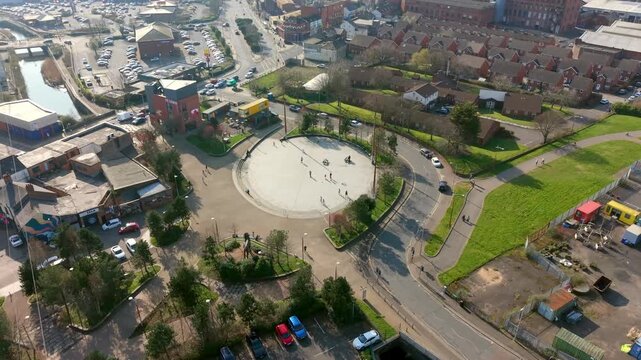 Wide clockwise 4K 60FPS aerial video of C.S. Lewis Square on the Newtownards Road in East Belfast, Northern Ireland in the UK. Produced in 3840x2160 ratio and with Rec709 color.