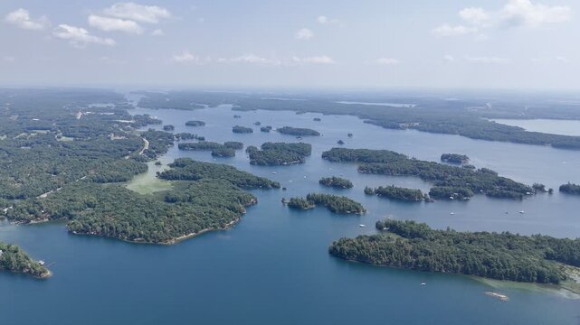 Aerial view of lush islands and blue water in the 1000 Islands region, St. Lawrence River, Canada. g