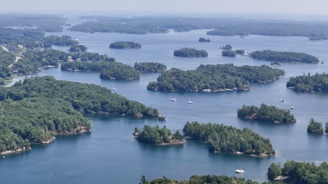 Aerial view of lush islands and blue water in the 1000 Islands region, St. Lawrence River, Canada. g