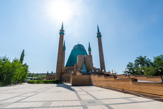 Mashkhur Jusup Mosque in the center of Pavlodar on a blue sky background in summer.