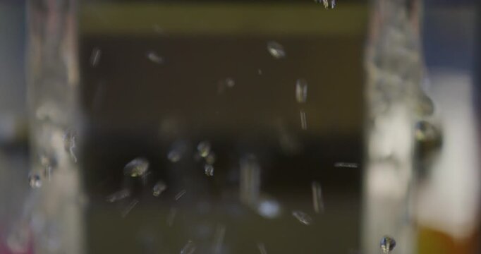 Water Wheel and Droplets Splashing Slow Motion Close