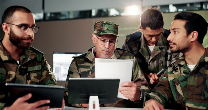 Military, captain or meeting with document in command center for tactical report, planning or strategy. Mature man, paperwork or soldier team with tablet for war alert, threat detection or operations