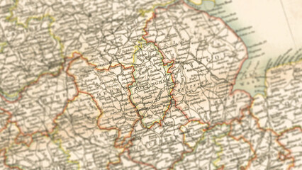 Fototapeta premium Macro View of Vintage Map Highlighting Nottinghamshire England with Detailed Regional Cartography