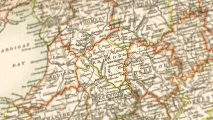 Obraz premium Macro View of Vintage Map Highlighting Radnorshire England with Detailed Regional Cartography