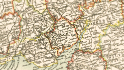 Obraz premium Macro View of Vintage Map Highlighting Monmouthshire Wales with Detailed Regional Cartography
