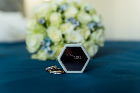 Elegant Bridal Accessories and Ring Box Collection on Deep Blue Background