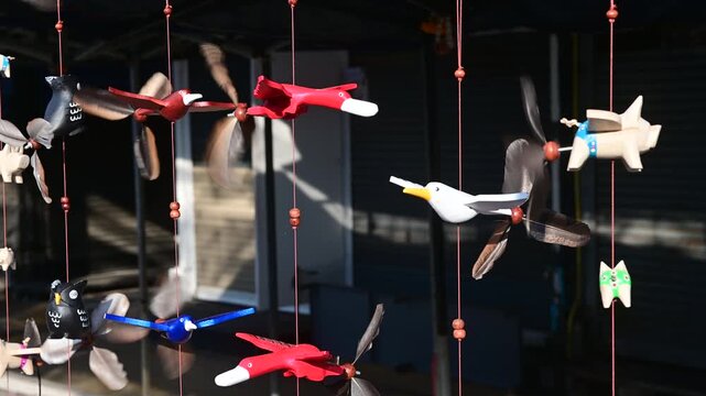4K Movement of bird wind hanging mobile