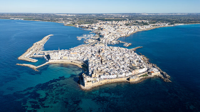 Aerial view of Gallipoli old town with fort, ramparts and harbor, Puglia, south Italy