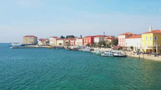 Panorama of coastal town of Porec in Istria, Croatia, with harbor and promenade