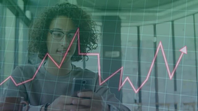 Man typing with thumbs on smartphone, checking pink finance chart peaking then spiking and smiling