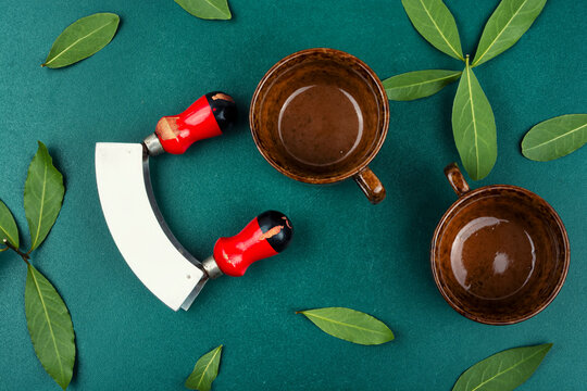 Herbal tea setup with bay leaves
