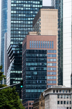 Frankfurt Germany city skyline with modern glass tower skyscraper and surrounding urban buildings highlighting contemporary architecture growth and vertical cityscape