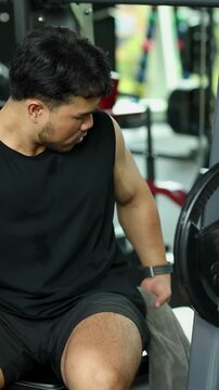 Friendly Greeting Between Gym-Goers in Fitness Center