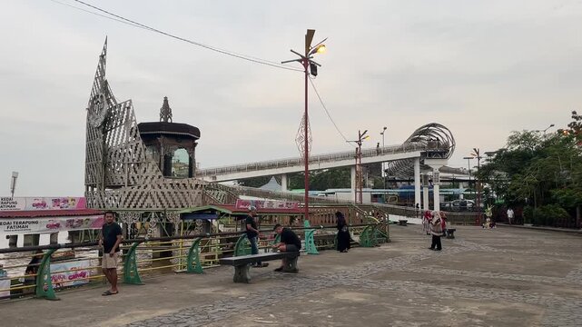 Atmosphere at the Kapuas waterfront square in the afternoon on January 21, 2026 in Pontianak, Indonesia
