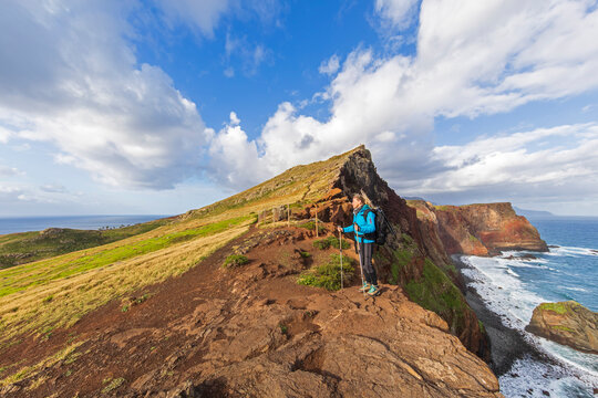 Tourist hiking on PR 8 Vereda da Ponta de S�o Louren�o trail in Madeira