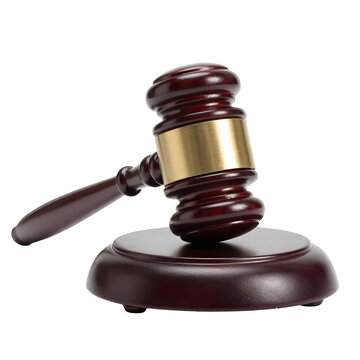 Gavel resting on its sound block conveys authority and fairness in legal proceedings
