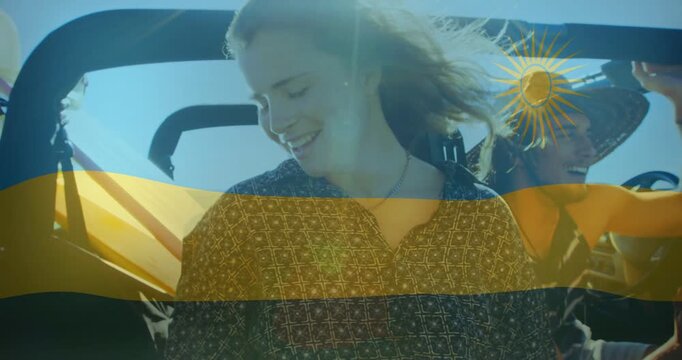 Woman smiling hair blowing as vehicle driving friends riding flag overlay shifting over people trip