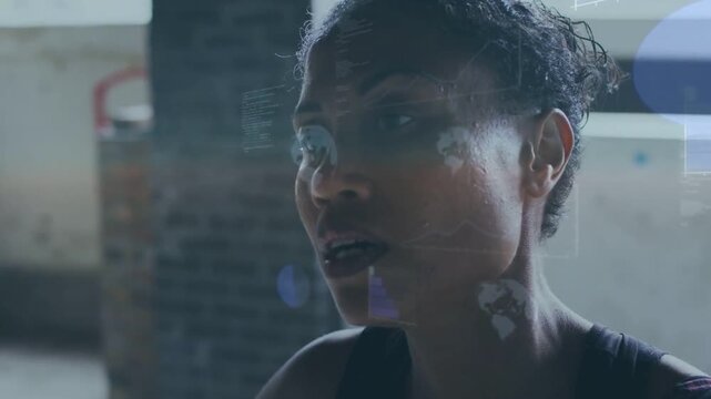Vertical video: Post-set woman breathing, focusing as HUD code rising around face for workout