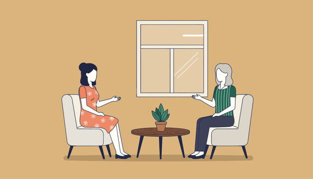 Two women engaging in a supportive conversation or counseling session, demonstrating active listening and interpersonal communication in a calm, inviting indoor environment