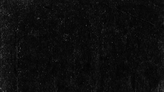Old paper texture stop motion video. Kraft paper texture with stains, grain, dust particles. Abstract animated 4K backdrop