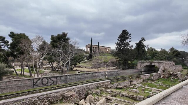Train passing by the Temple of Hephaestus in Athens, Greece
