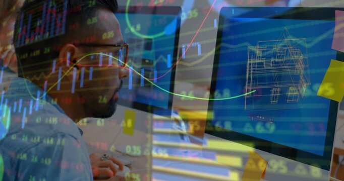 Designer leaning at desk, pulsing market tickers on wireframe causing typing to analyze data