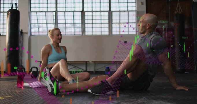 Gym partners resting, talking then high-fiving, celebrating while data graphics sweeping over pair