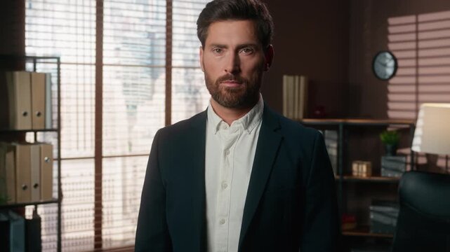 Serious middle-aged business man looking at camera modern marketing company owner startup founder adult bearded businessman male specialist with working ambitions agent executive CEO posing in office