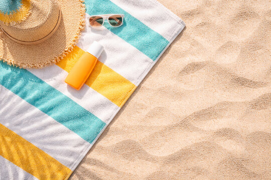 protection, accessories on a beach. zenith view and copy space