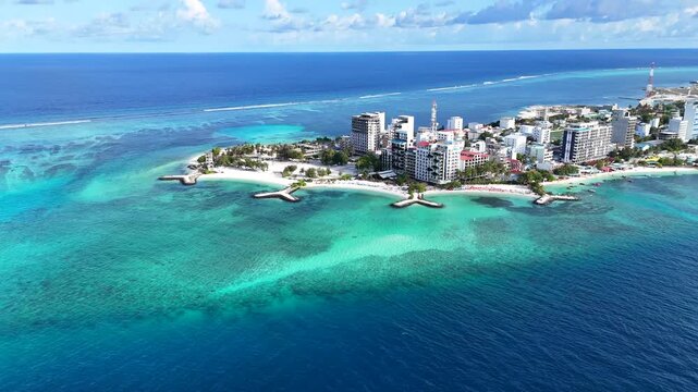 Wide Aerial of Maafushi Island Surrounded by Coral Reef Maldives