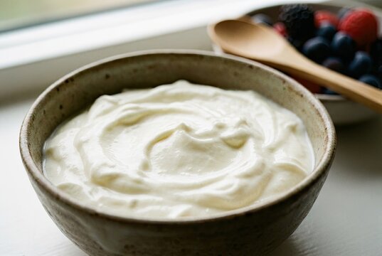 Creamy Skyr in Ceramic Bowl with Ripples, Close-up Under Soft Natural Light