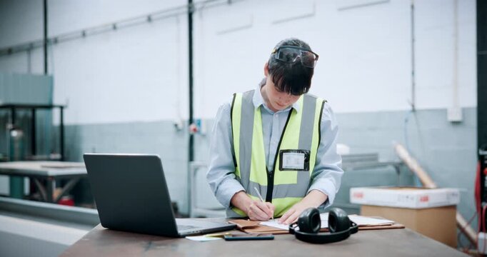 Woman, engineer and typing with laptop at warehouse for research, machine update or technical guide. Person, pc or production manual, automation information and diagnostics document for manufacturing