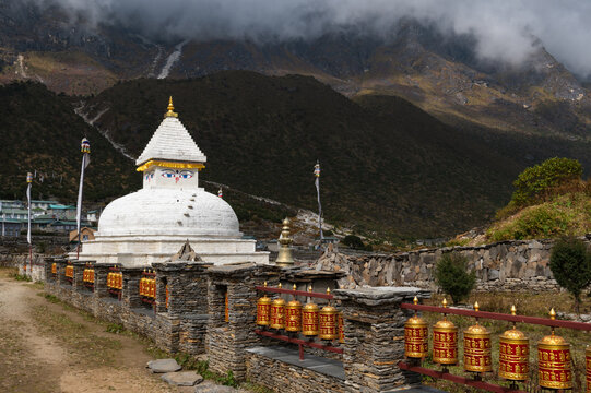 Khunde Stupa Nepal Buddhist monument with prayer wheels Himalaya mountain landscape spiritual travel