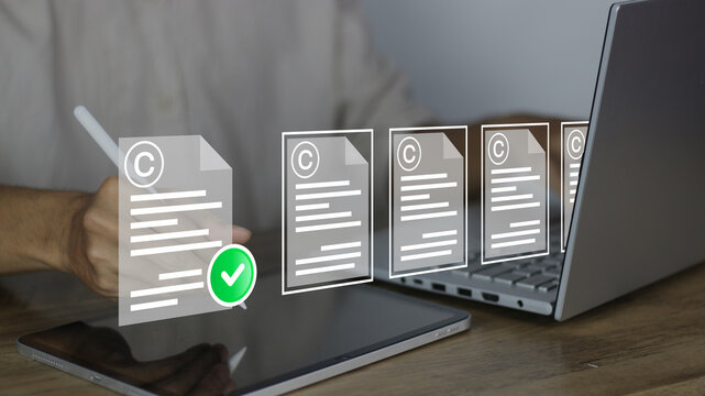 Intellectual copyright concept of a man using a laptop to manage patents and intellectual property protection law and rights through digital document legislation and legal verification icons