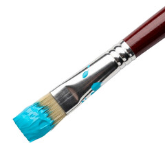 Fototapeta premium Close up of a paintbrush with vibrant blue paint on transparent background