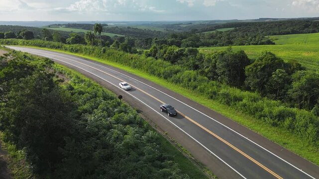 Aerial timelapse of the highway with moving cars in Brazil. State of Parana