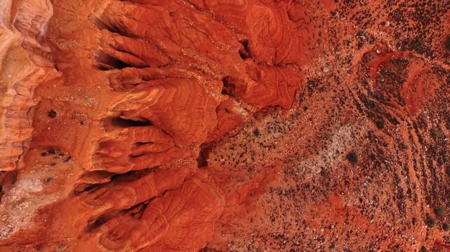 Top down view of red clay rock formations in Teruel. Aerial top view of eroded red sandstone and clay landscape in Teruel province Spain.
