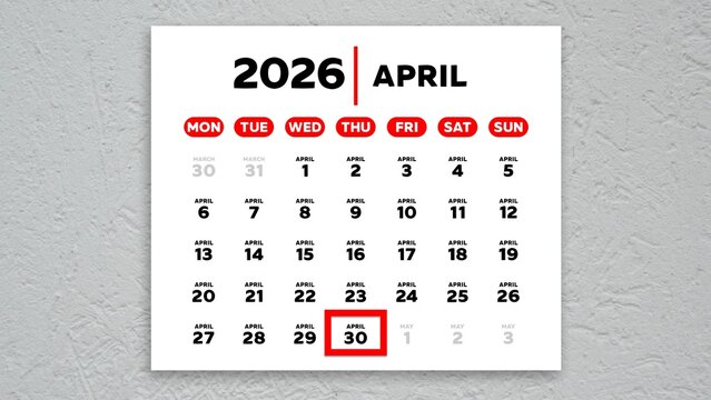 The date April 30th marked with a red cursor on the wall calendar 2026