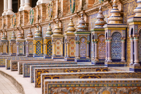 Series of tiled Provincial Alcoves, Azulejos, along the curved perimeter of Plaza de Espa&ntilde;a, Seville, Spain