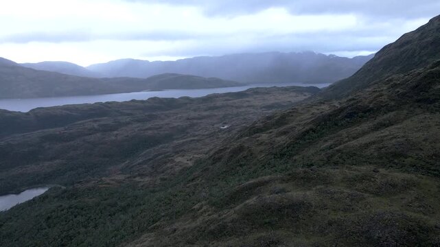 Calbuco chile patagonia river lake nature mountain trees clouds winter dusk morning drone