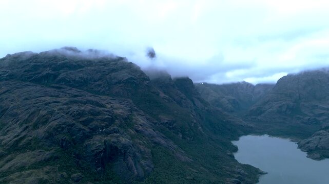 Calbuco chile patagonia river lake nature mountain trees clouds winter dusk morning drone