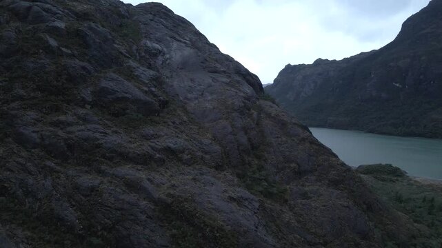 Calbuco chile patagonia river lake nature mountain trees clouds winter dusk morning drone