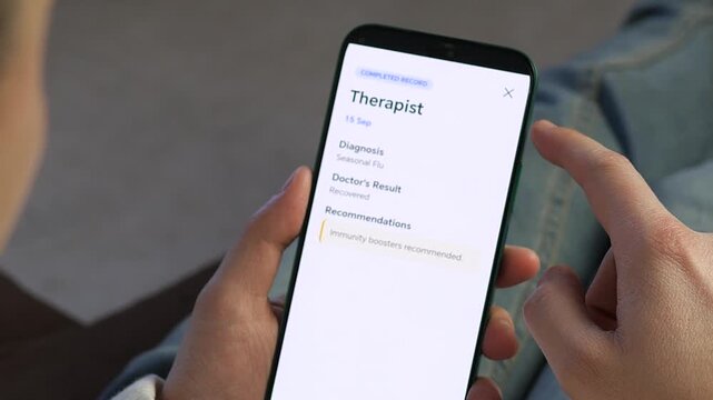 Patient tracking medical visits with a sleek health app. Close-up of digital records including diagnosis and recommendations. Great for insurance, healthcare software, and personal wellbeing content