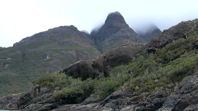 Calbuco chile patagonia river lake nature mountain trees clouds winter dusk morning drone