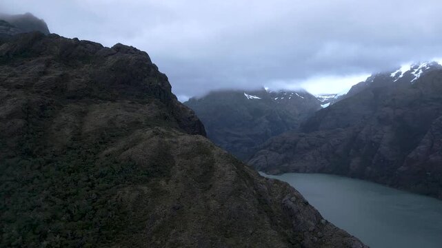 Calbuco chile patagonia river lake nature mountain trees clouds winter dusk morning drone