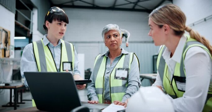 Meeting, robotics and women on tech in facility for machine design, inspection and software configuration. Automation, team and people on laptop for system diagnostics, assembly line and engineering