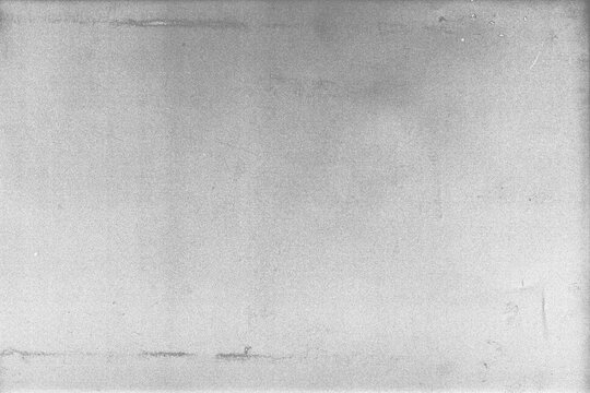 grunge paper texture,grunge overlay effect with scratch and dust on black background,retro noisy grain dust texture for film or photo overlay,black and white grunge distressed texture overlay texture